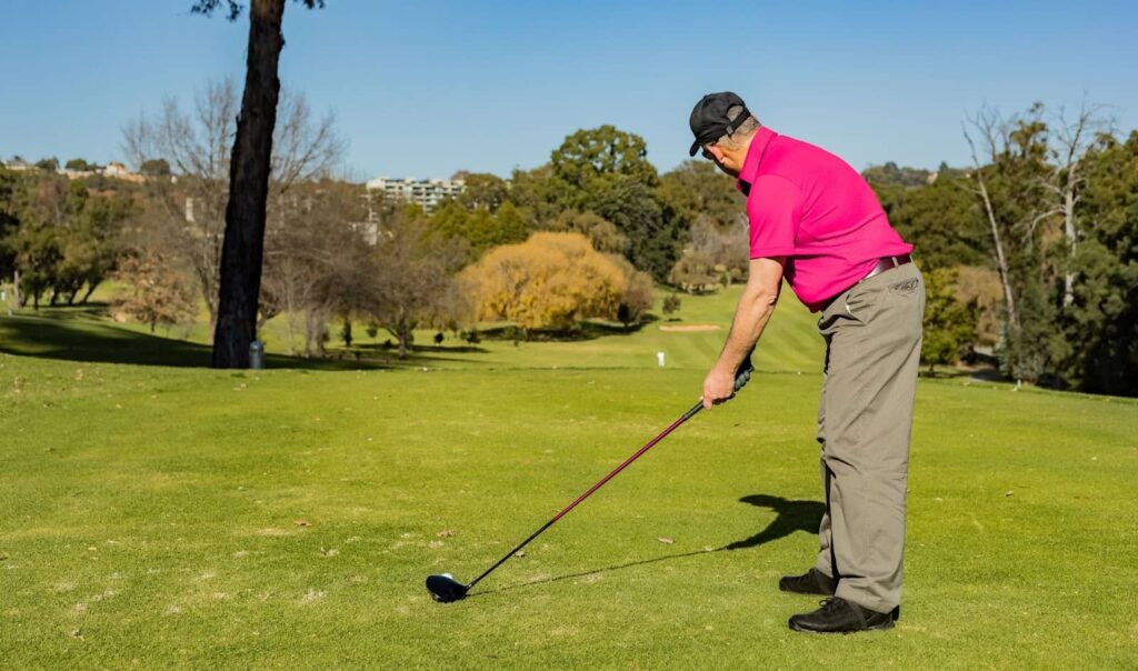 Professional golf player playing in a golf club